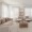 room with couch chair and large windows