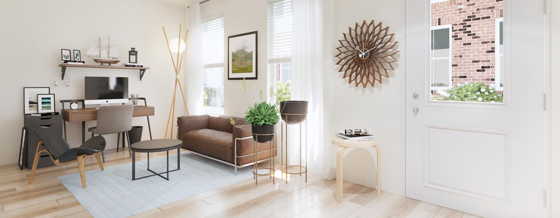 a room with a desk and chairs