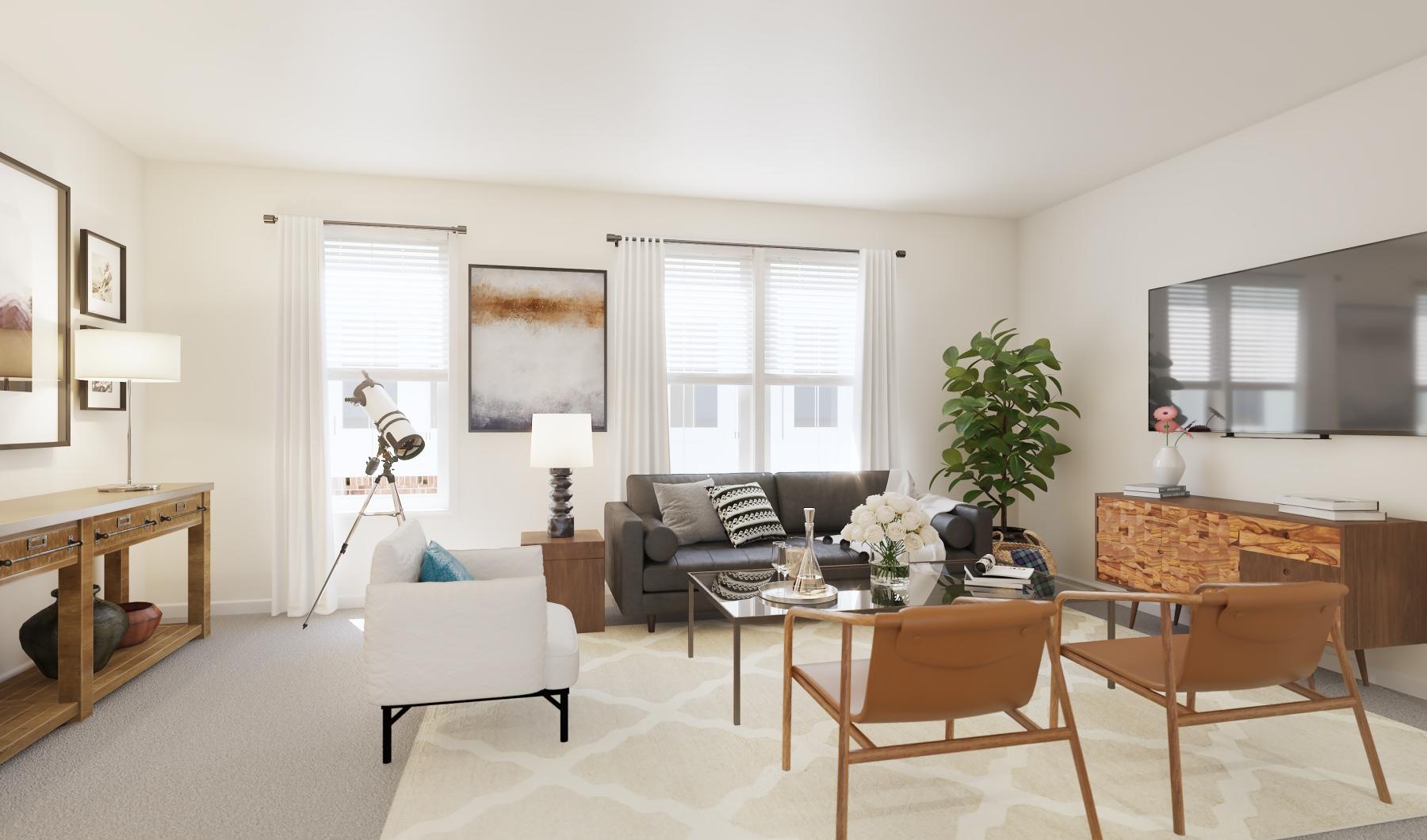Generous living spaces with beautiful natural lighting a living room with a large window
