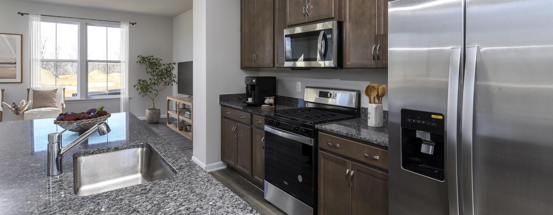 a kitchen with stainless appliances